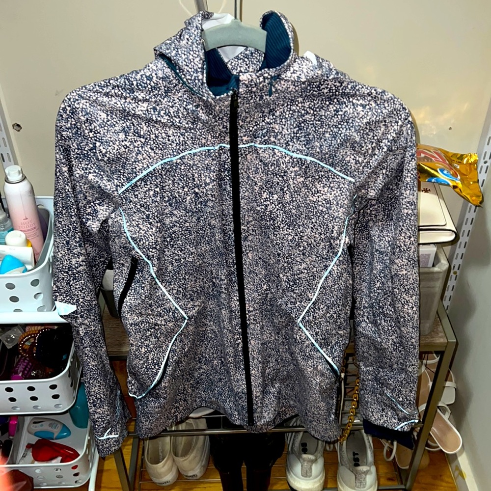 Navy and light pink lululemon rain jacket